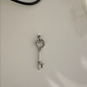 Elegant Silver Heart Key Pendant